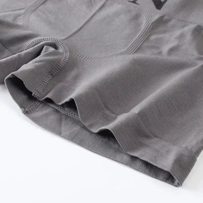 Gray stretch boxer brief close-up of leg opening and stitched pouch seam