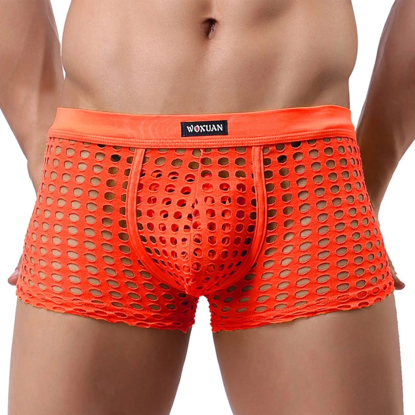 Orange open-mesh cutout shorts with dotted perforations and contoured pouch, elastic waistband