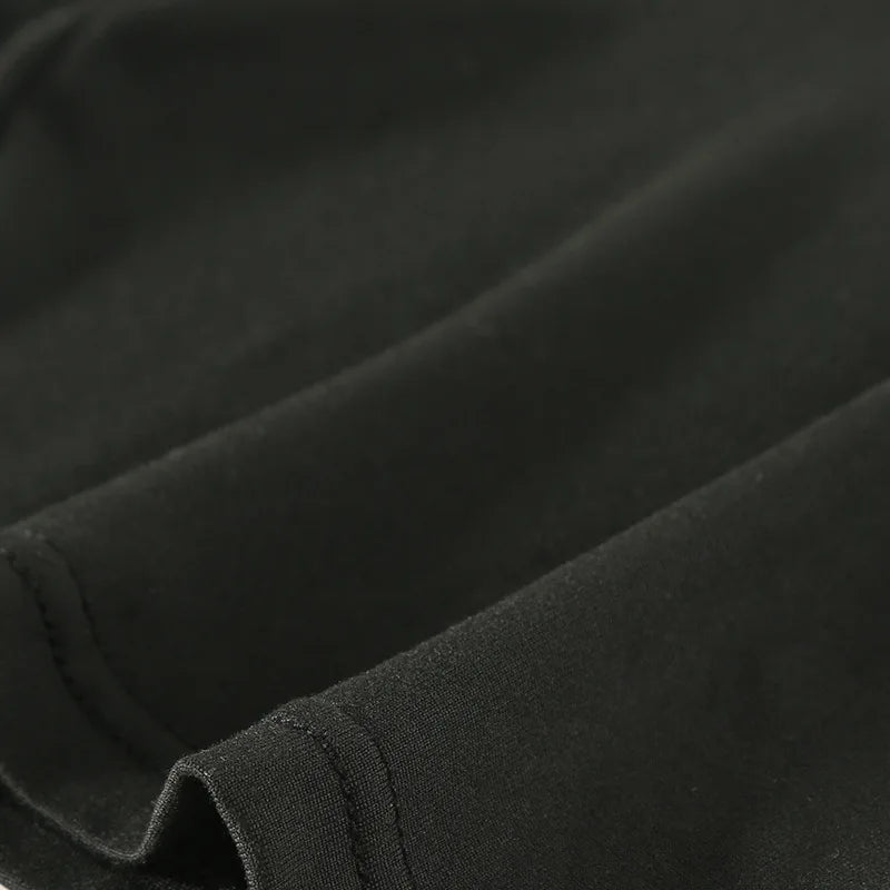 Black boxer brief fabric and stitched waistband close-up
