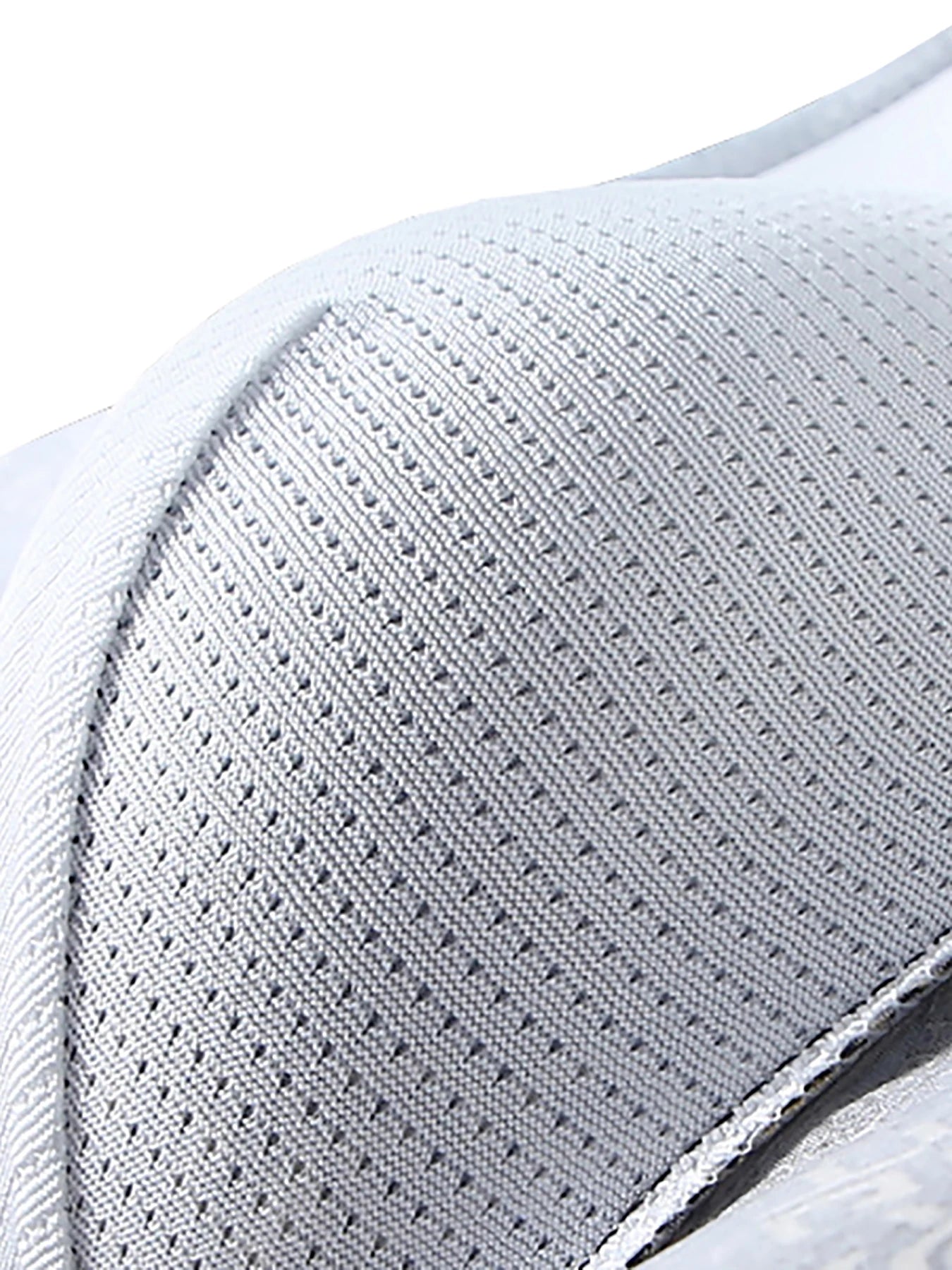 Light gray knit fabric with stitching close-up for boxer briefs