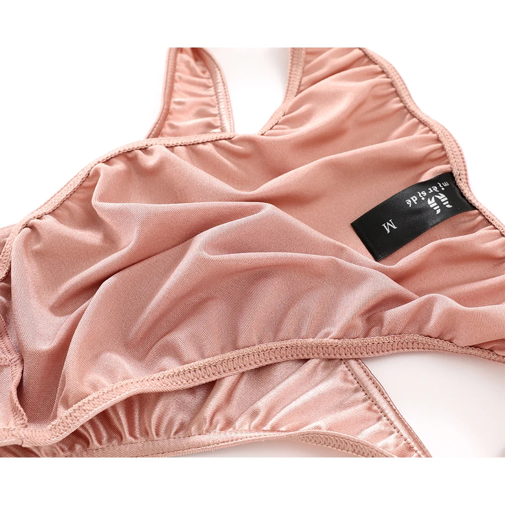 Blush pink satin silky brief with side stitching, stretchy waistband, close view