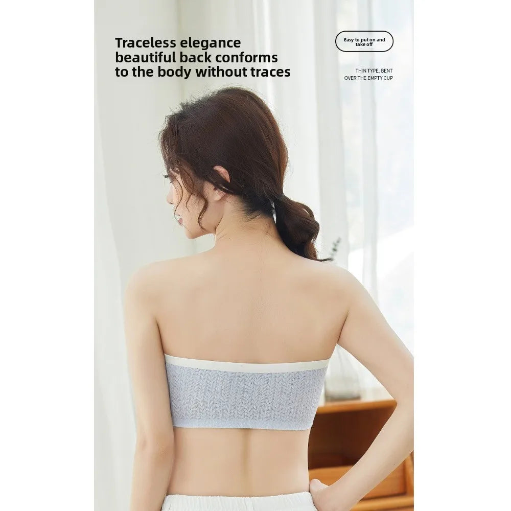 Back view of light blue strapless seamless lift bra with wide elastic band