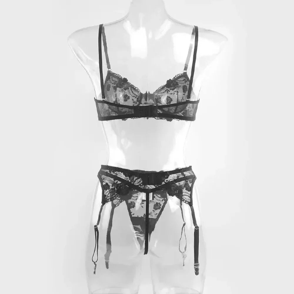 Black lace bra with underbust trim and sheer garter panty with thigh straps