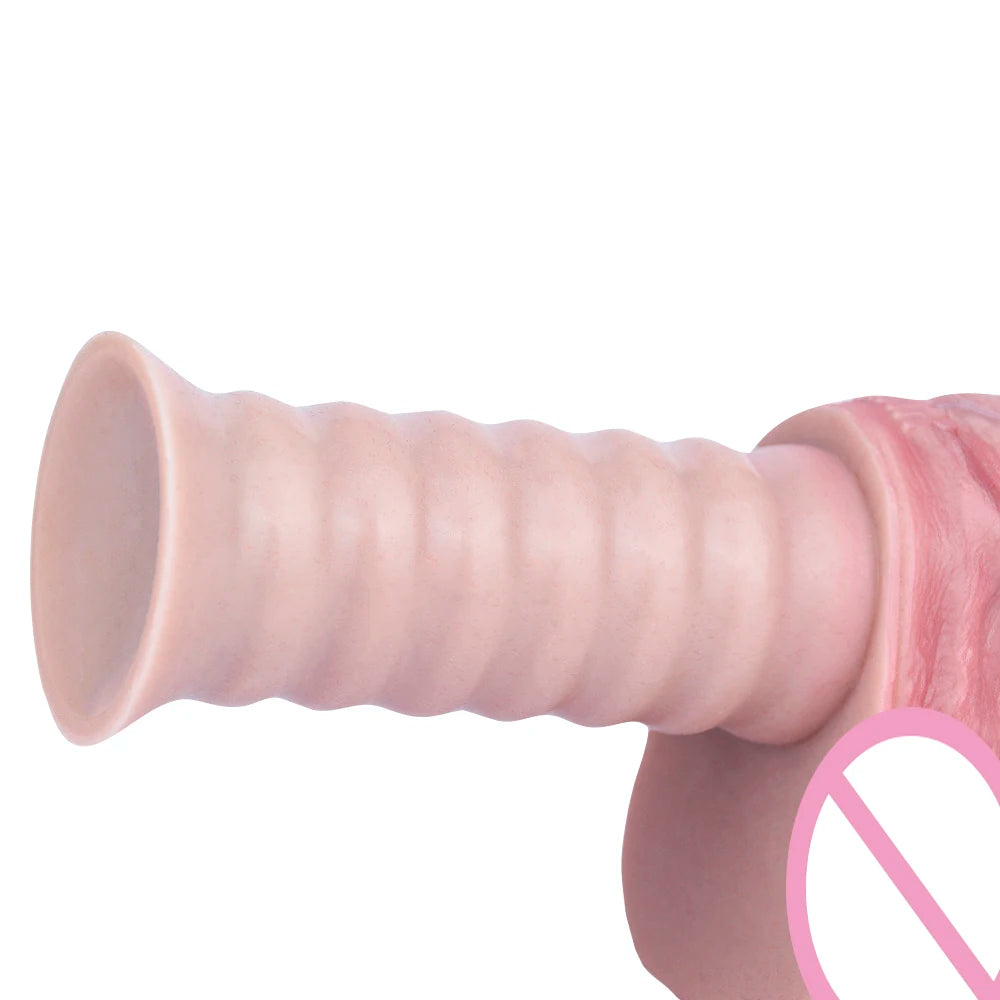 Close-up of light pink silicone dildo with flared tip and smooth textured shaft