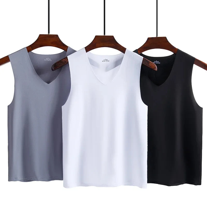 Men's traceless V-neck tank tops in light gray, white, and black on hangers