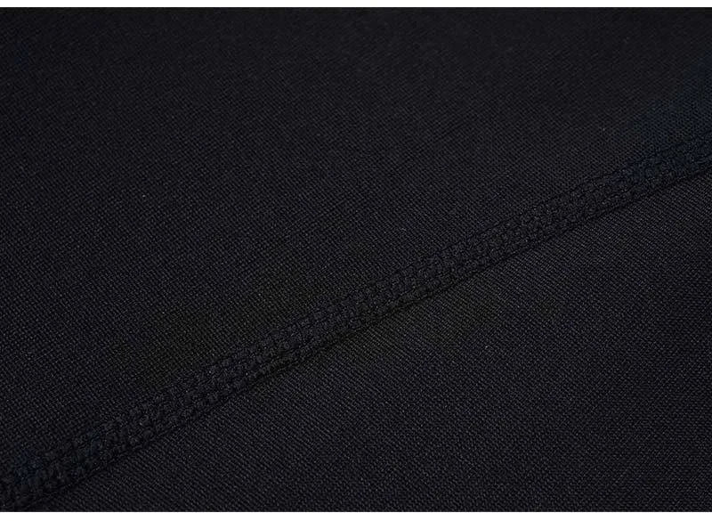 Black athletic boxer shorts fabric texture with stitched seam