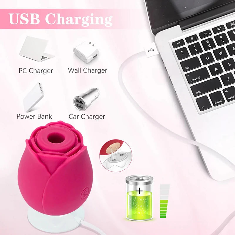 Red rose suction clitoral vibrator on charging cable; power button and charging indicator