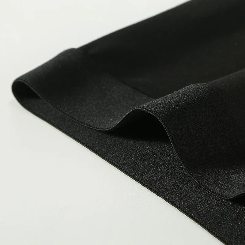 Black boxer briefs leg seam and fabric edge close-up