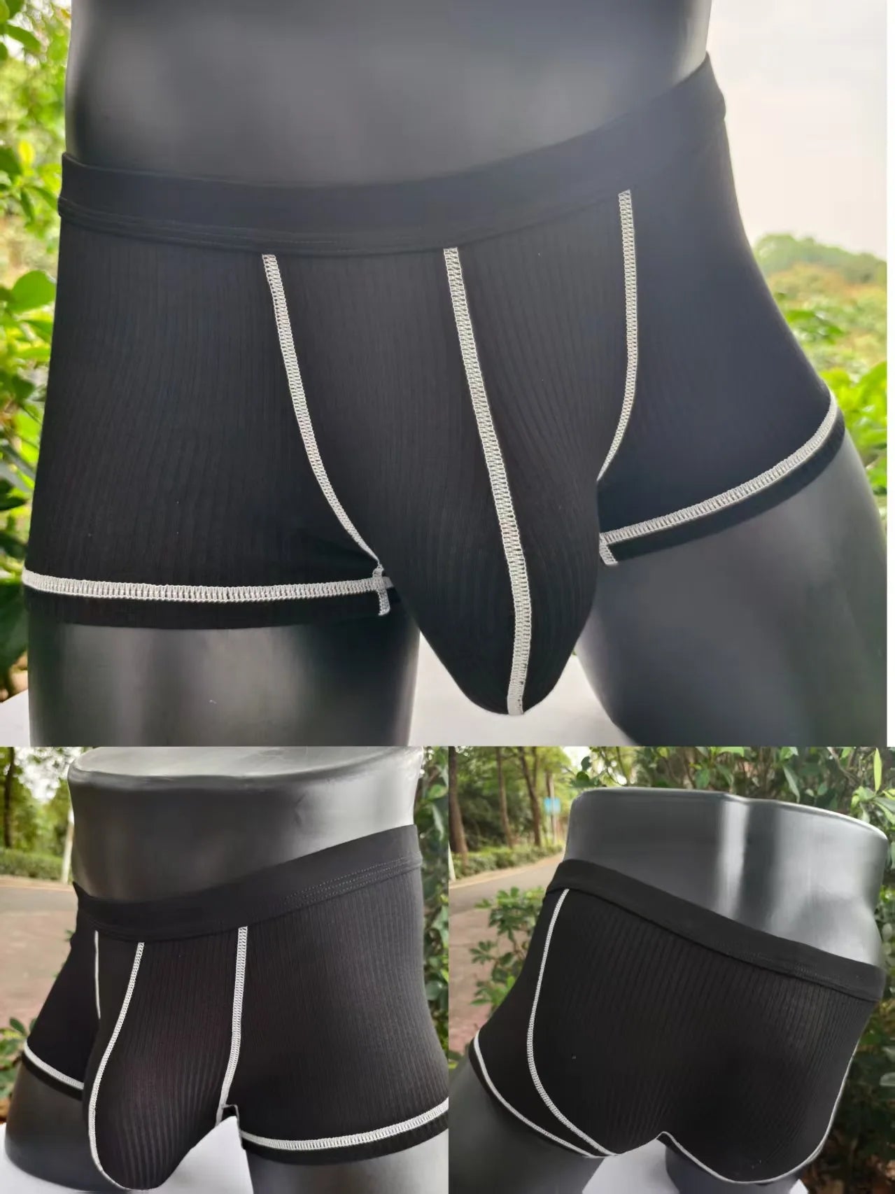 Black ribbed boxer shorts with white contrast piping and black waistband.