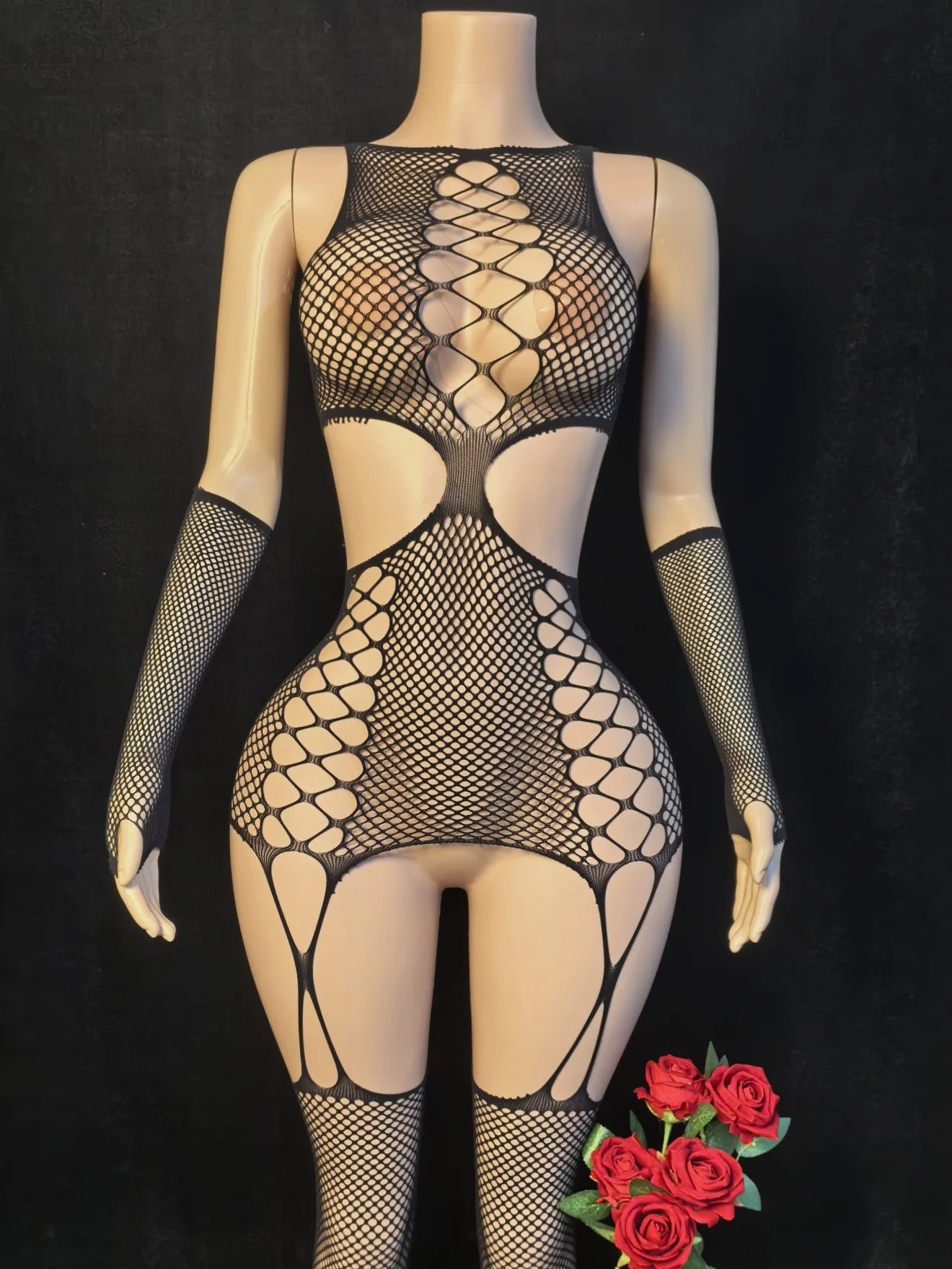 Black sheer fishnet catsuit with open lattice back and high-cut thigh openings