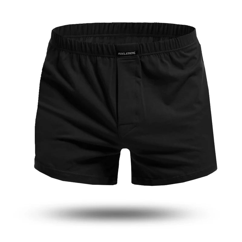 Black cotton pyjama boxer shorts with elastic waistband and central front seam