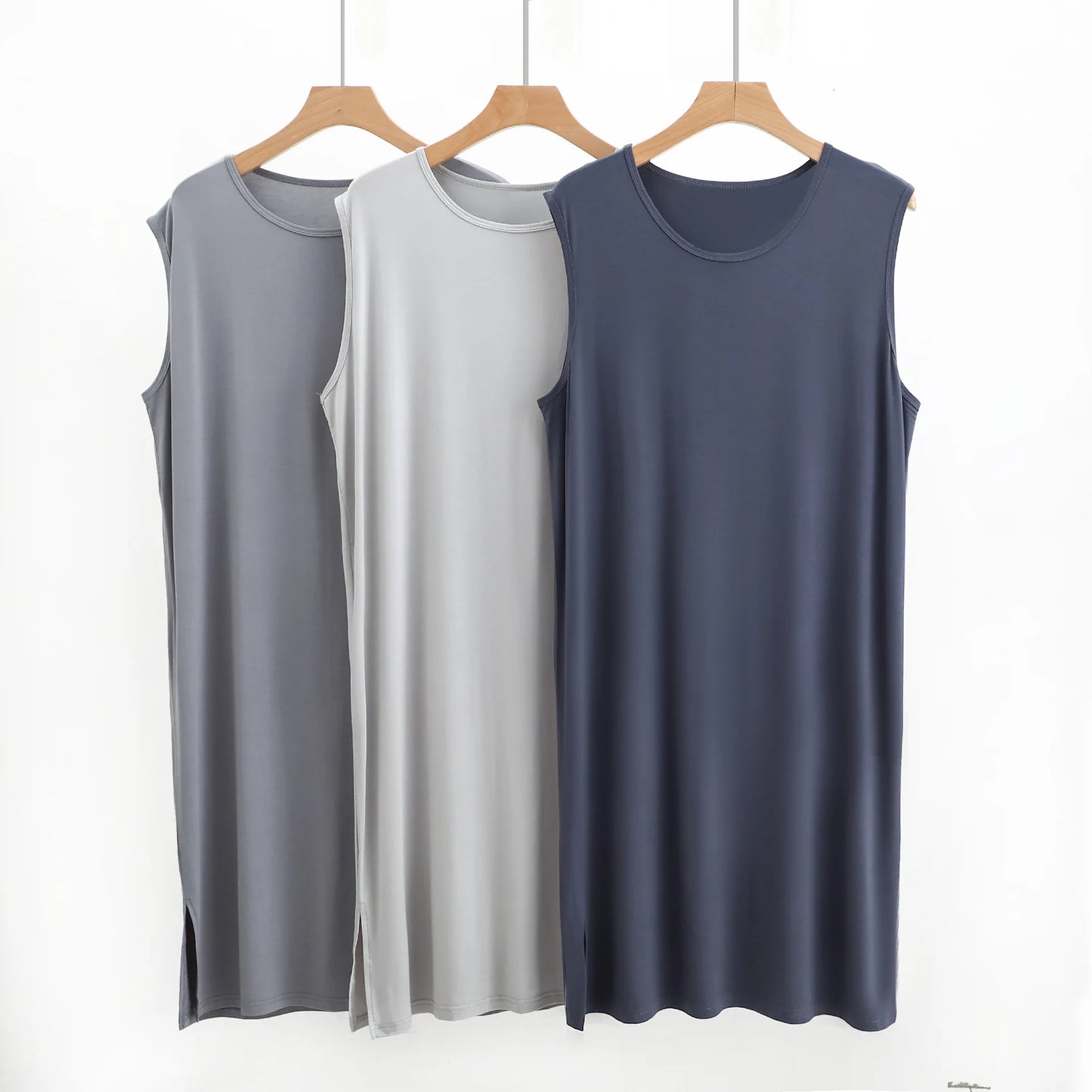 Sleeveless sleepwear vest dress in dark gray, light gray, and navy on hangers