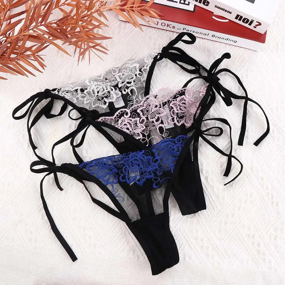 Pink and blue embroidered lace panty briefs with black bow ties