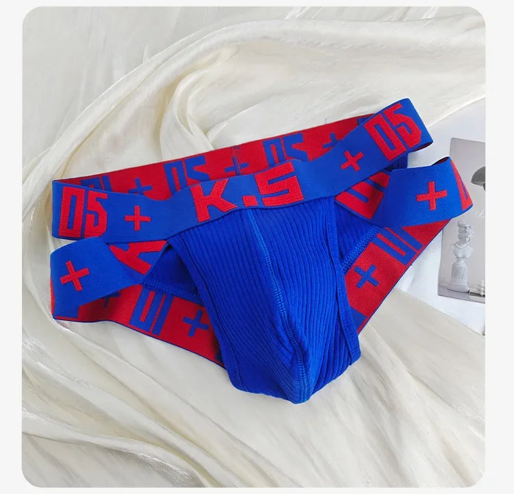 Blue ribbed stretch brief with wide elastic waistband and red/black logo pattern.