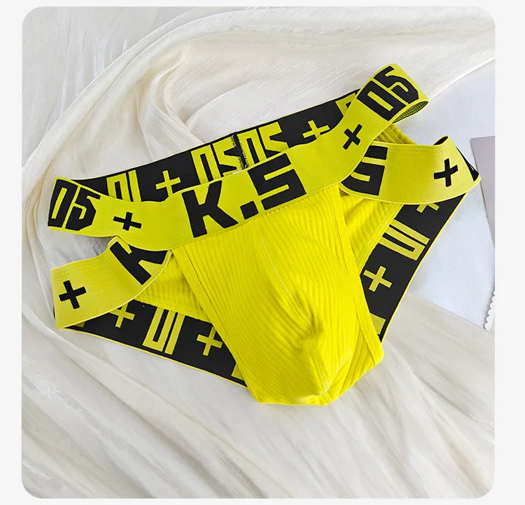 Yellow ribbed stretch brief with wide elastic waistband and black logo print.