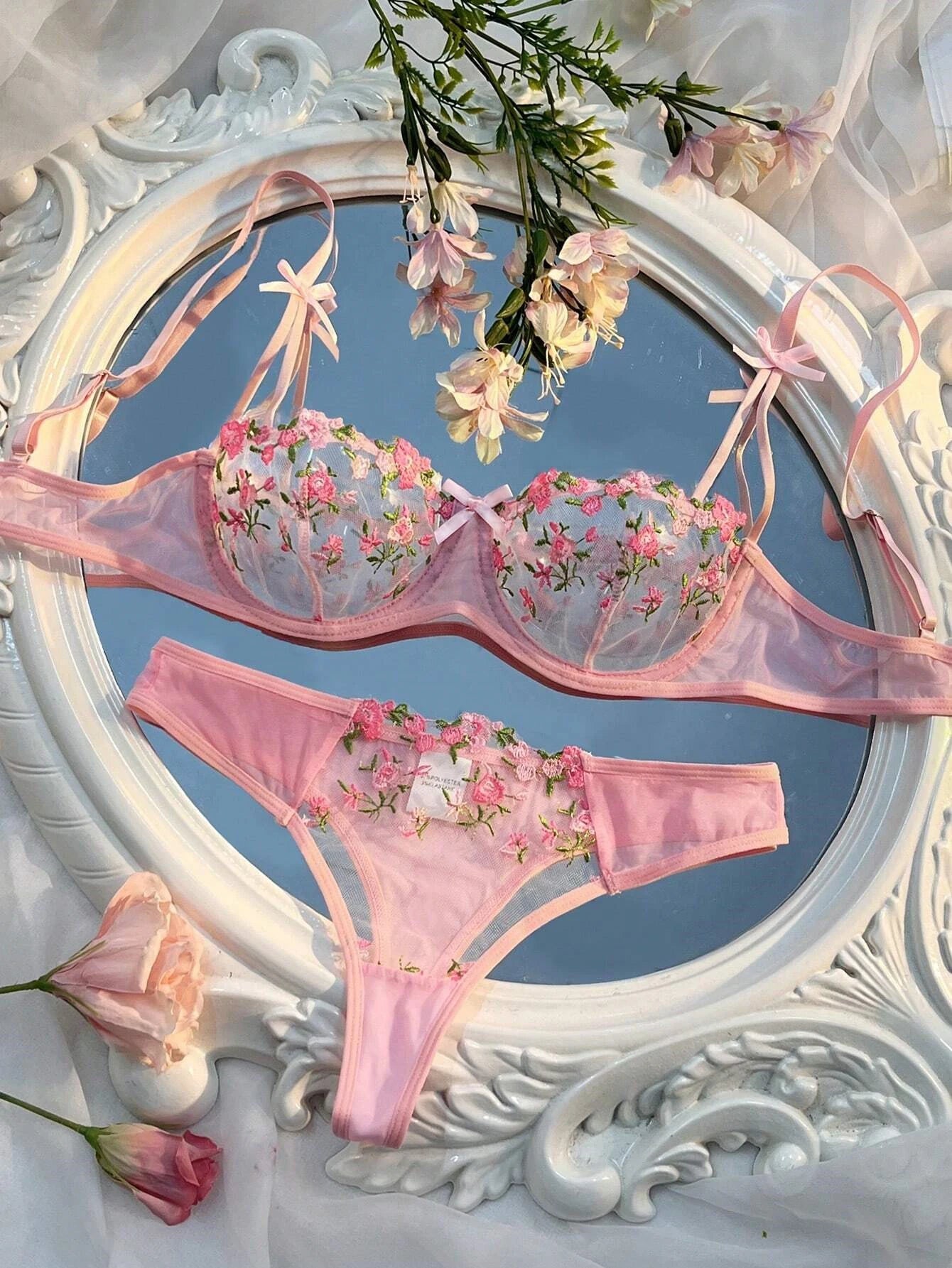 Pink sheer lace floral bra with matching thong, embroidered flowers and bow straps