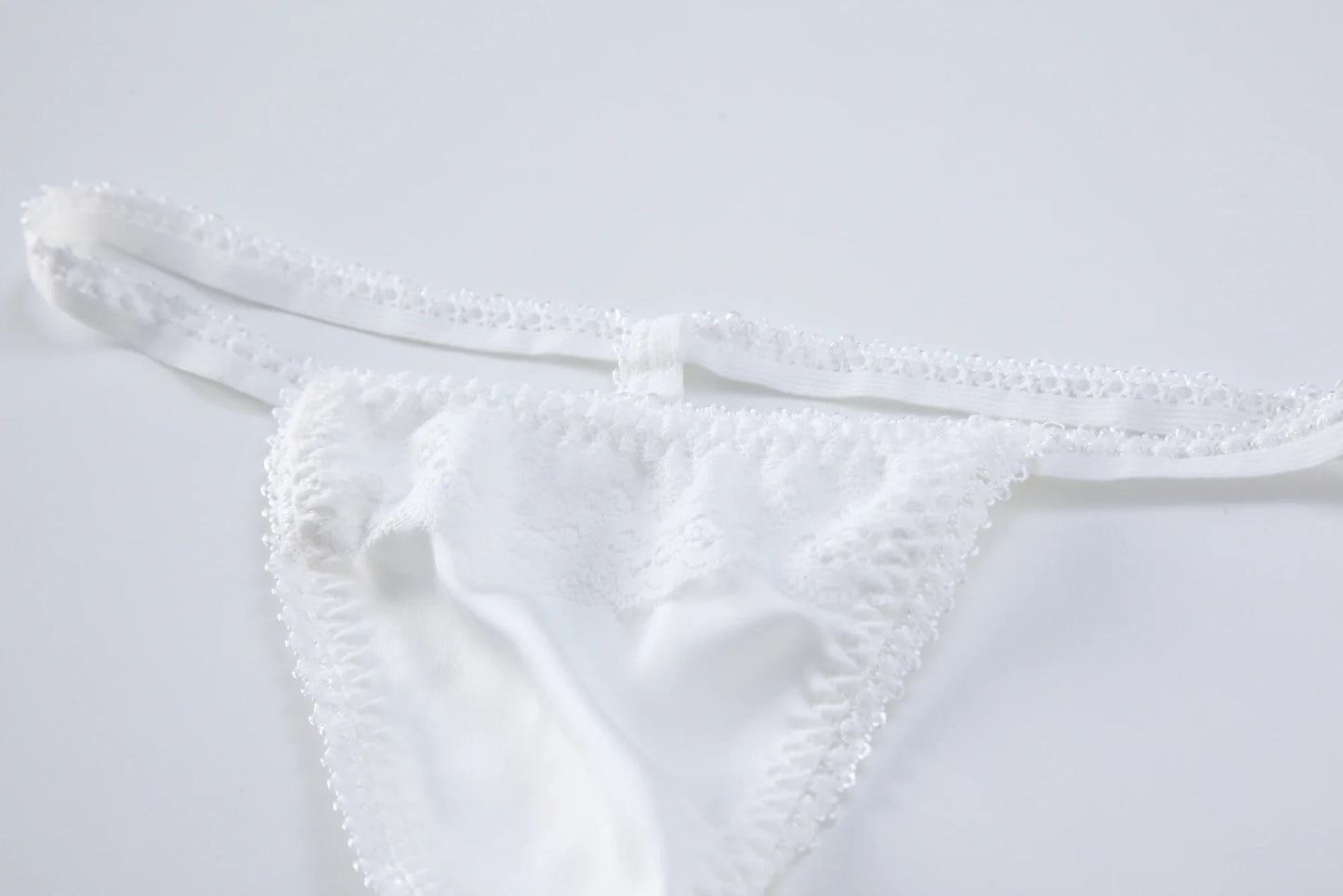 White triangle lace backless bodysuit bottom with elastic leg openings