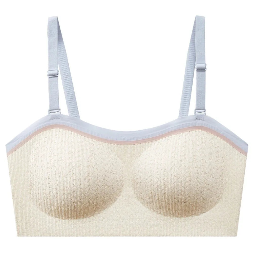 Seamless wireless lift bra in white, front view with wide straps and molded cups