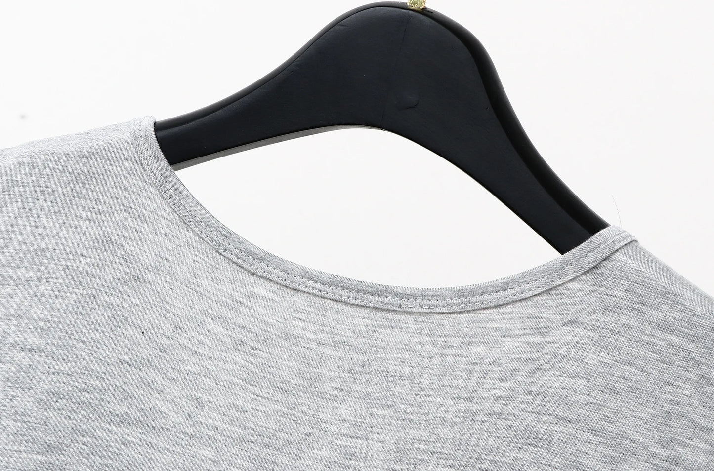 Gray sleeveless sleepwear vest dress back neckline close-up on hanger