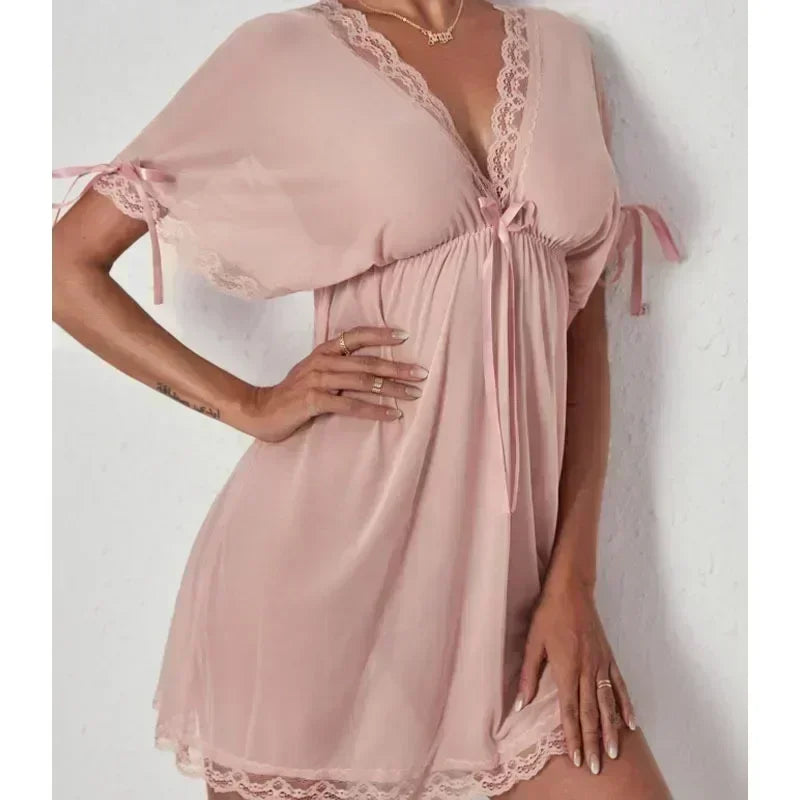 Light pink deep-V lace slip nightdress with lace neckline and ribbon bow