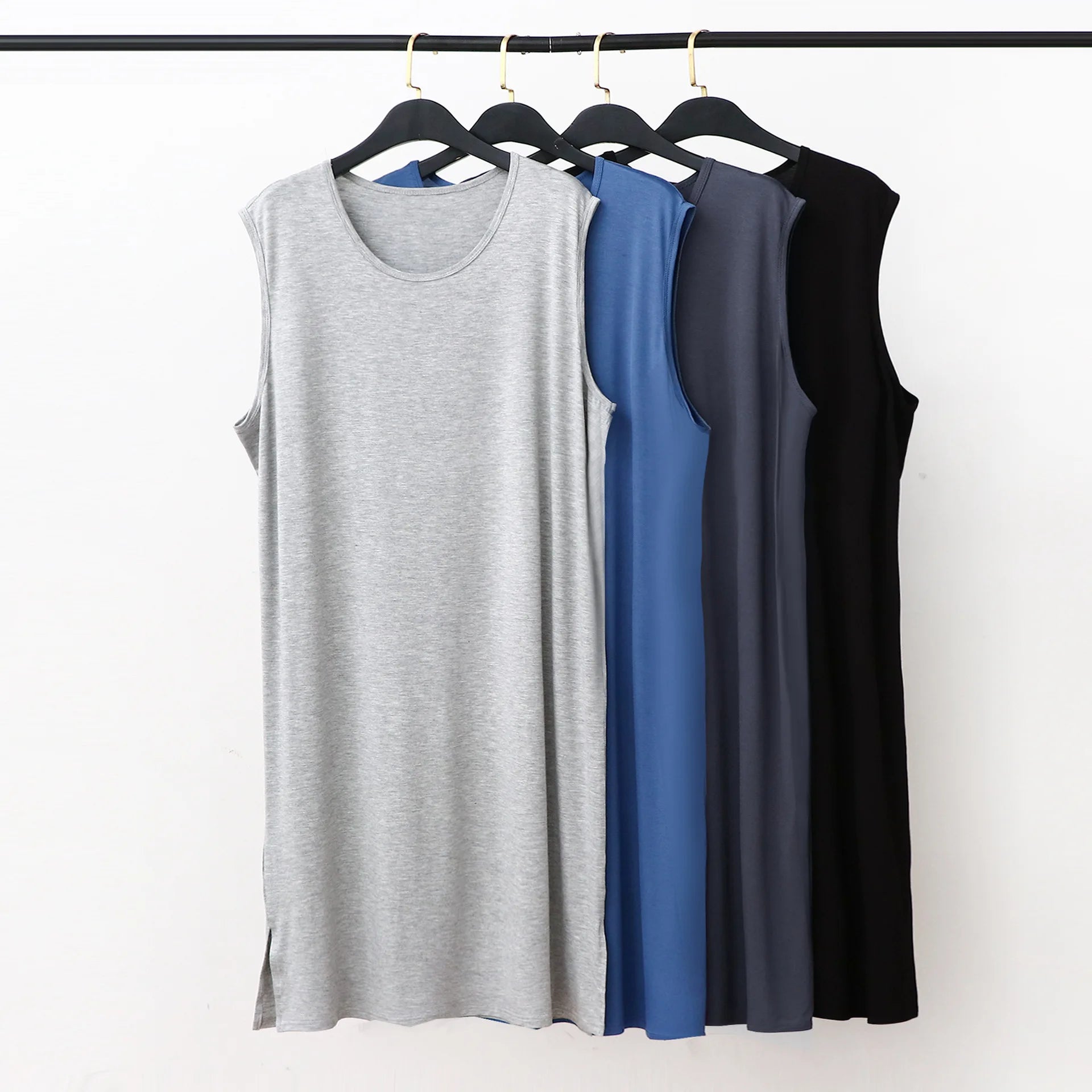 Sleeveless sleepwear vest dress set in gray, blue, dark gray, and black on hangers