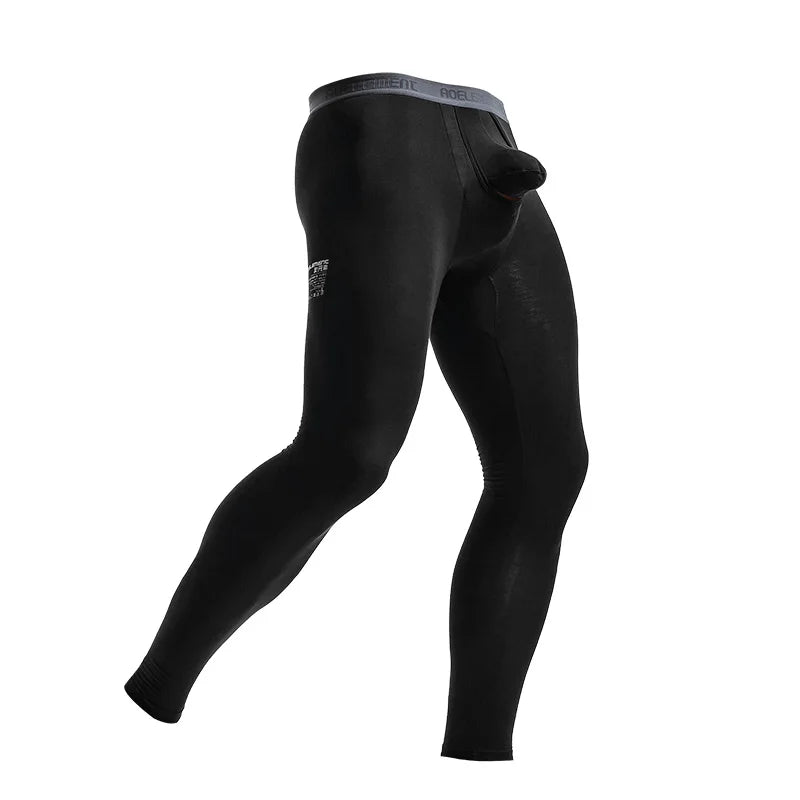 Black thermal base layer pants, fitted long bottoms with elastic leg openings