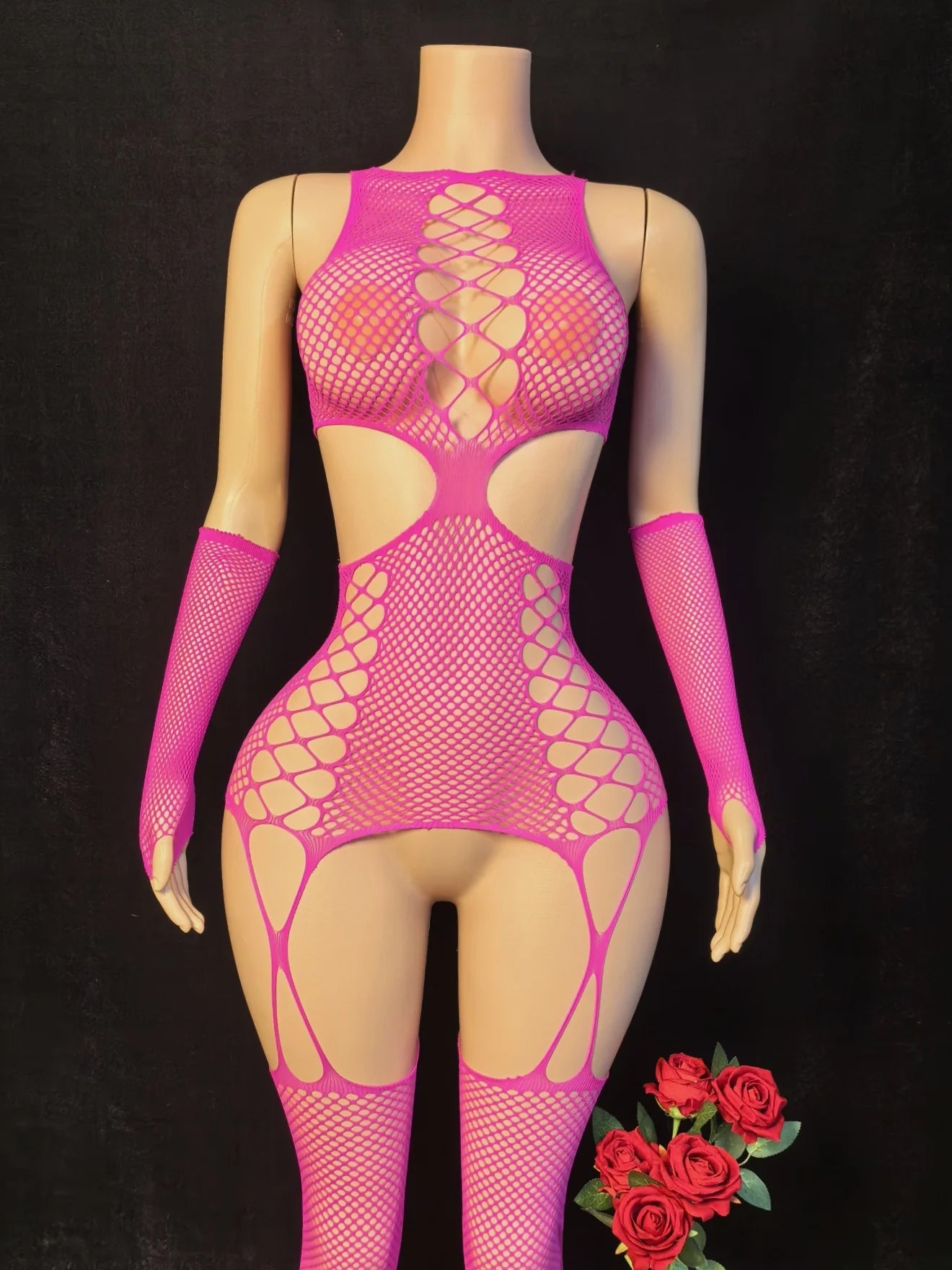 Magenta sheer fishnet bodystocking catsuit with open lattice torso and high-cut legs
