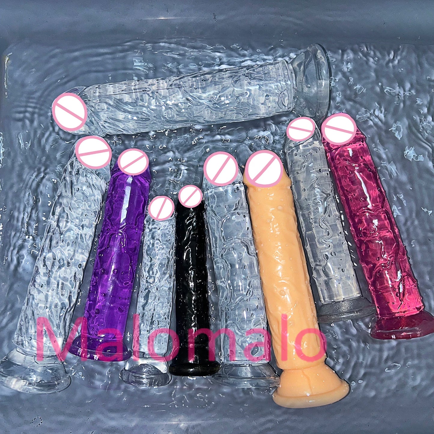 Assorted transparent jelly sex toys with suction bases in clear blue, purple, flesh, and magenta