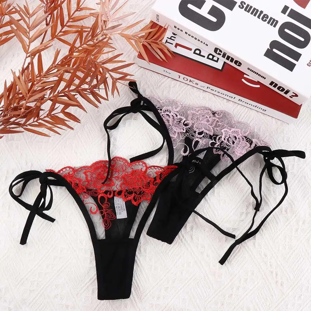 Red and lavender embroidered lace panty briefs with black bow ties