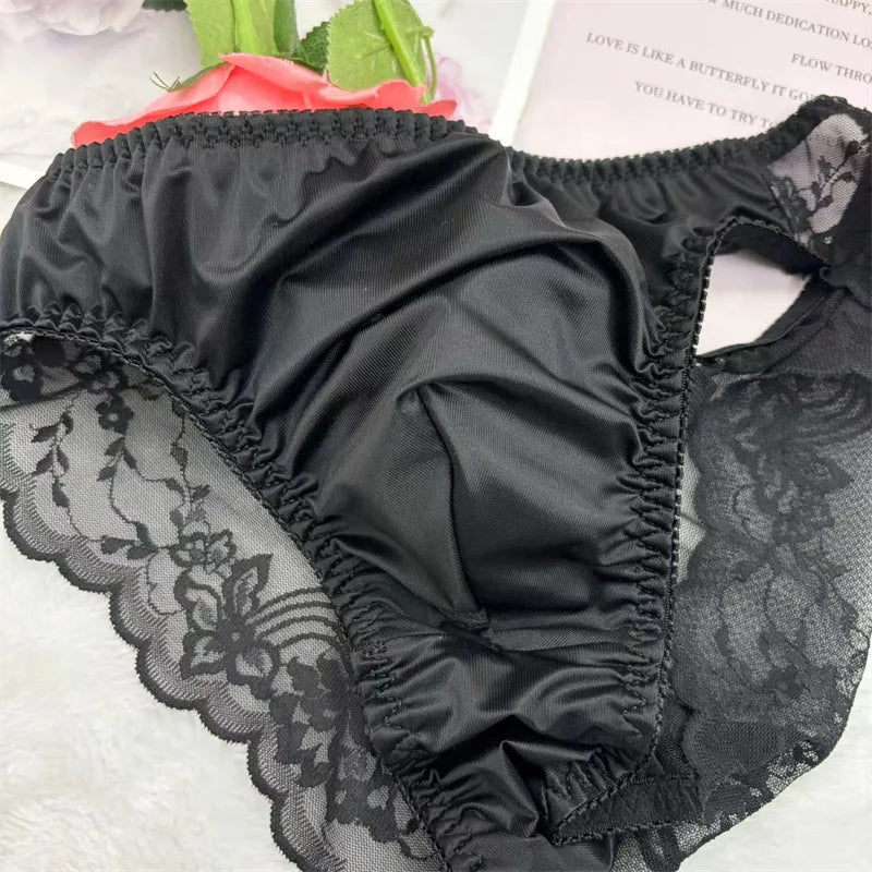 Black lace U-pouch brief close-up of side cutout and ruched center panel