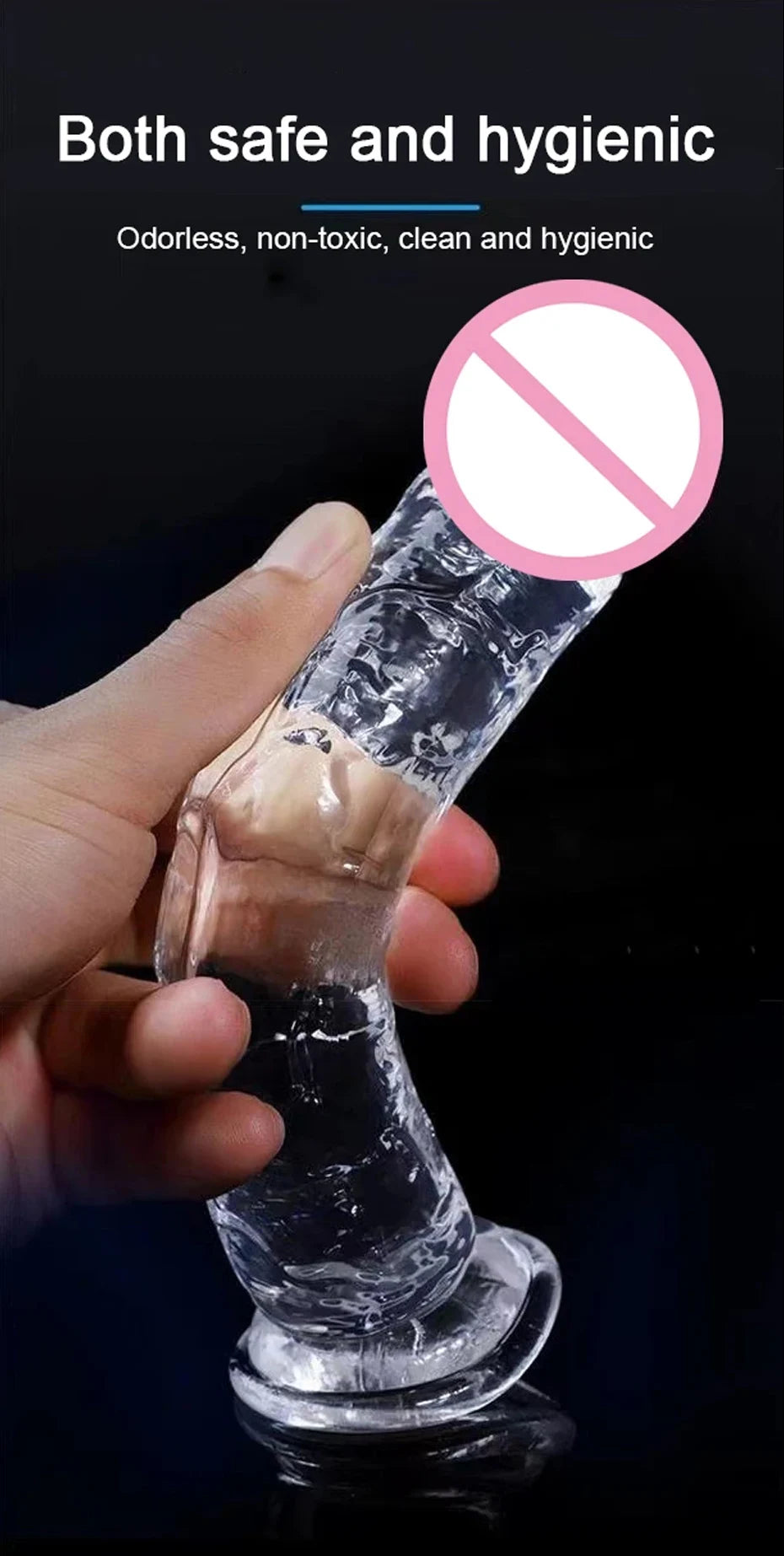 Clear jelly dildo with suction cup, held in hand, upright shape visible