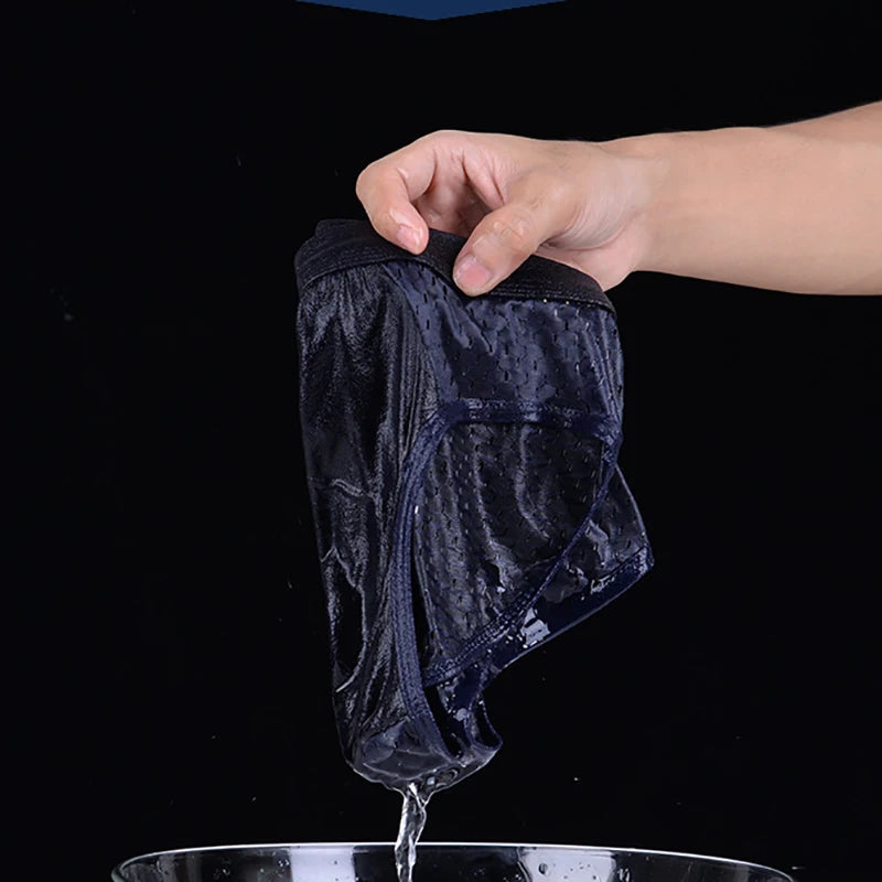Ice silk mesh square-cut briefs, dark blue/black fabric gathered in hand
