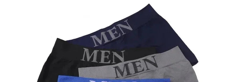 Stacked mixed-color stretch boxer briefs with logo waistband, navy and black visible