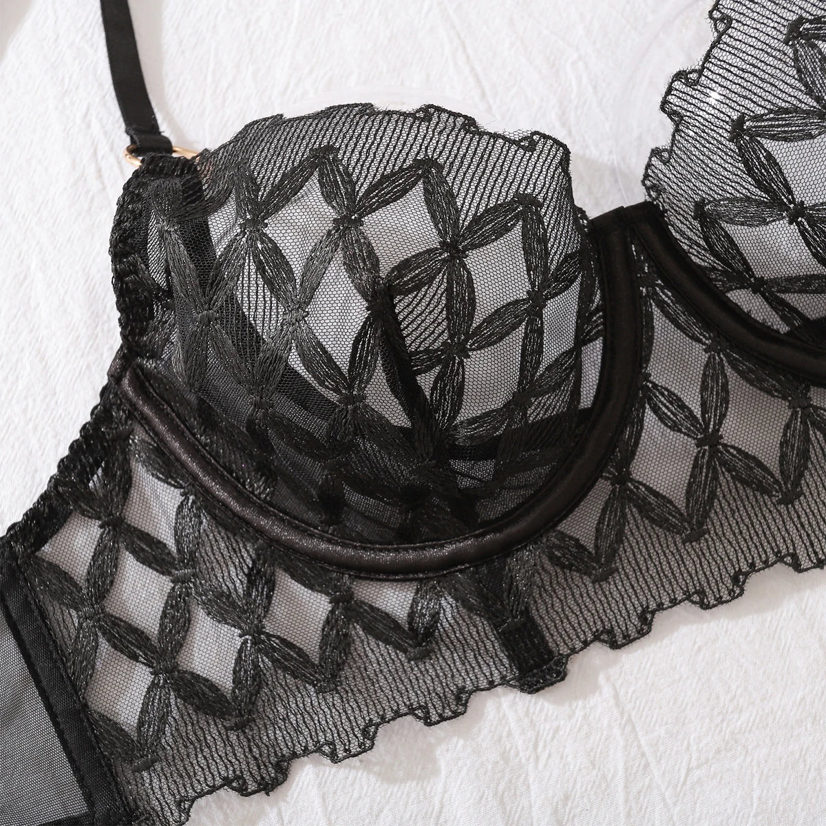 Black lace bra top with scalloped edge and structured underbust band