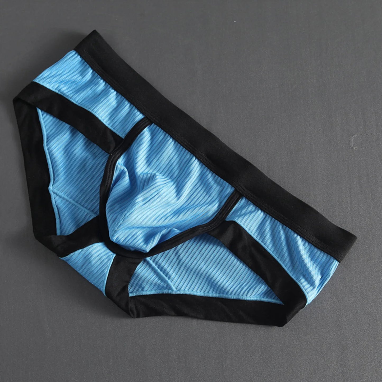 Striped U-pouch low-rise briefs in light blue with black trim and U-shaped pouch