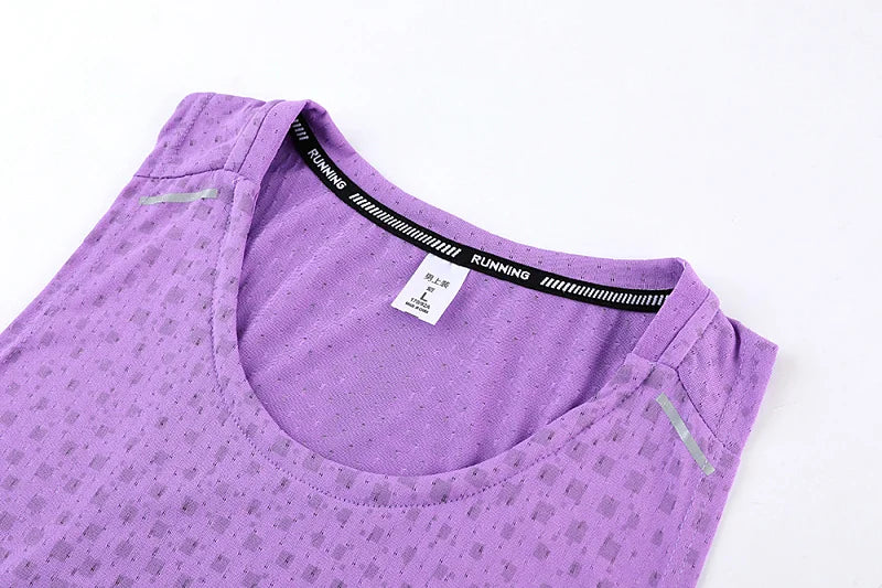 Purple breathable mesh gym vest tank close-up with round neck and size label