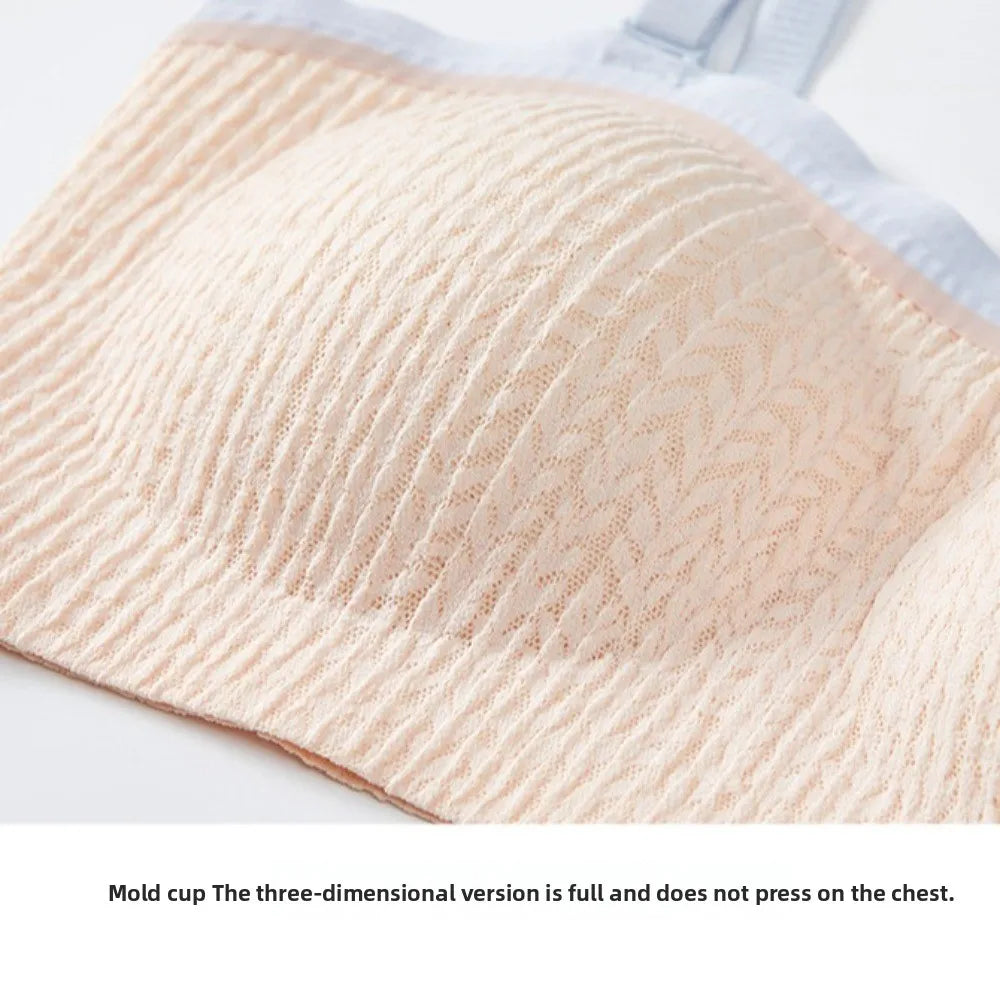 Seamless wireless lift bra fabric close-up in nude/cream, textured seamless knit