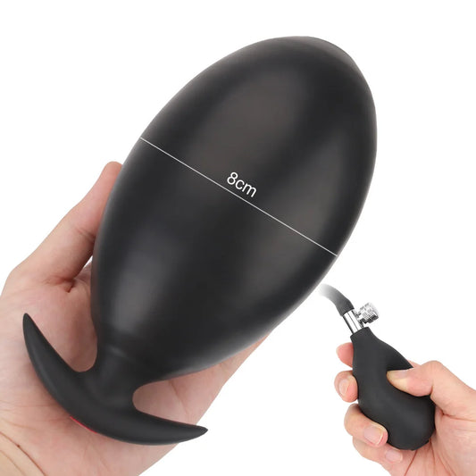 Inflatable anal plug, matte black, curved body with flared end and pumping nozzle